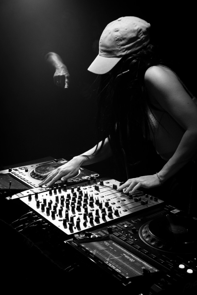 DJ at the decks, black and white