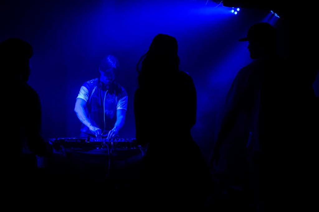 DJ in blue club light